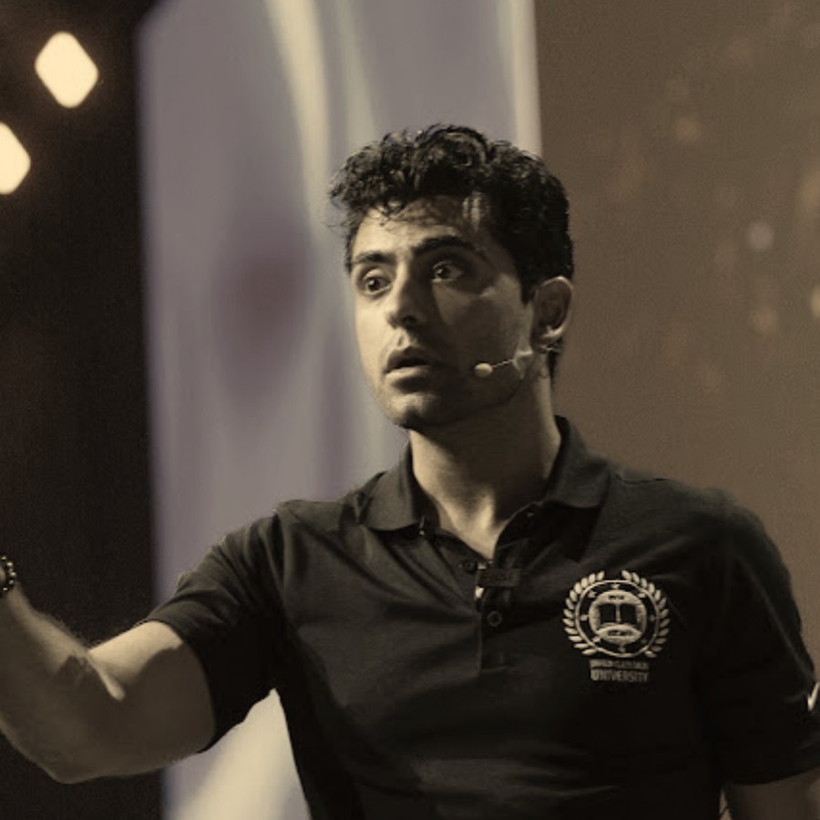 Daniel G speaking on stage